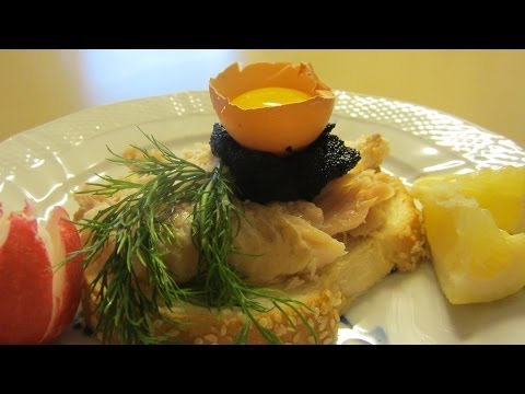 Smørrebrød Smoked White Fish Sandwich with Caviar and Raw Egg Yolk