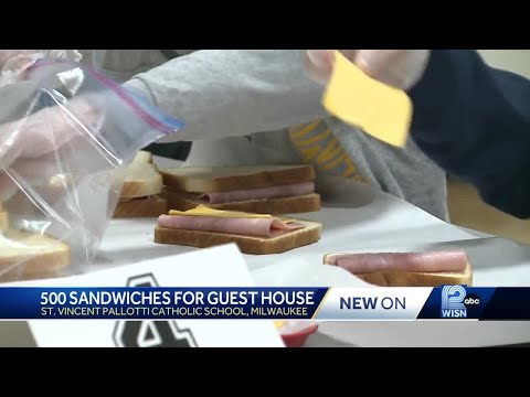 Group of Catholic school students make 500 sandwiches for those in need
